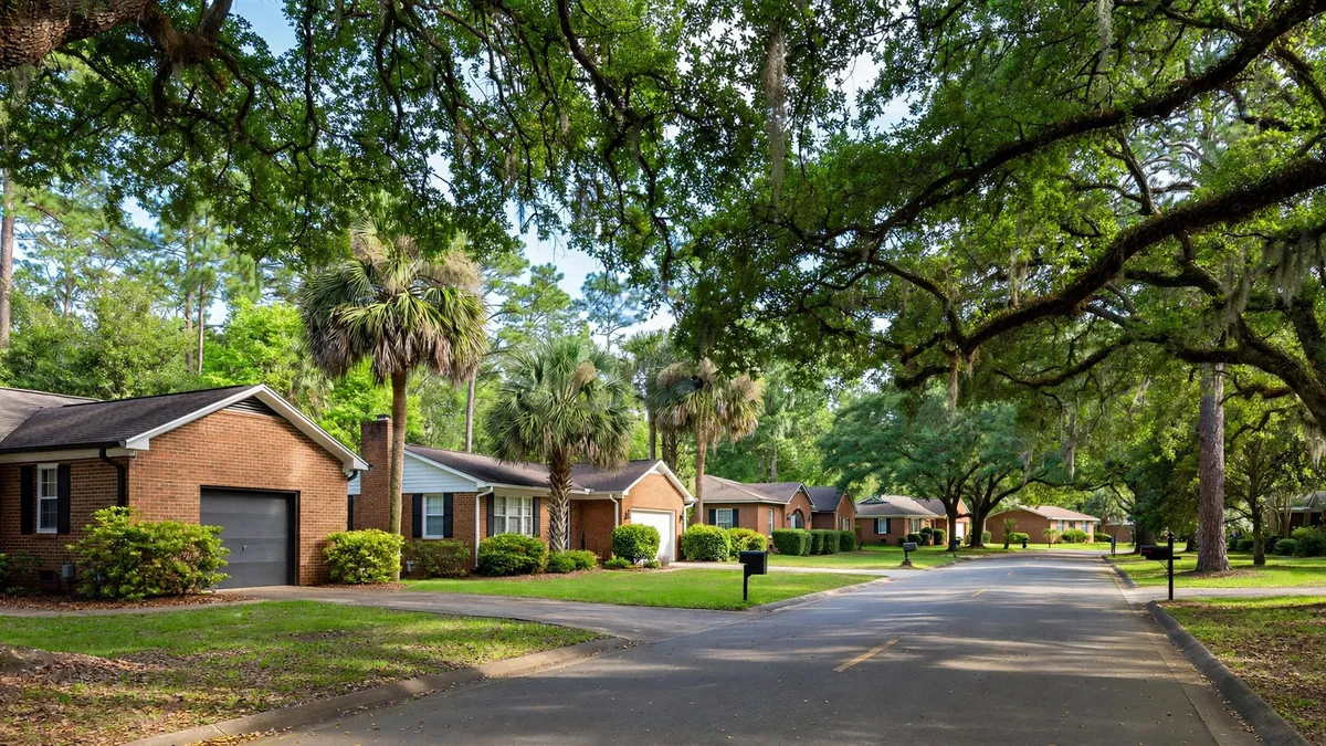 Mid-century brick homes on a wooded street in Forest Acres, SC